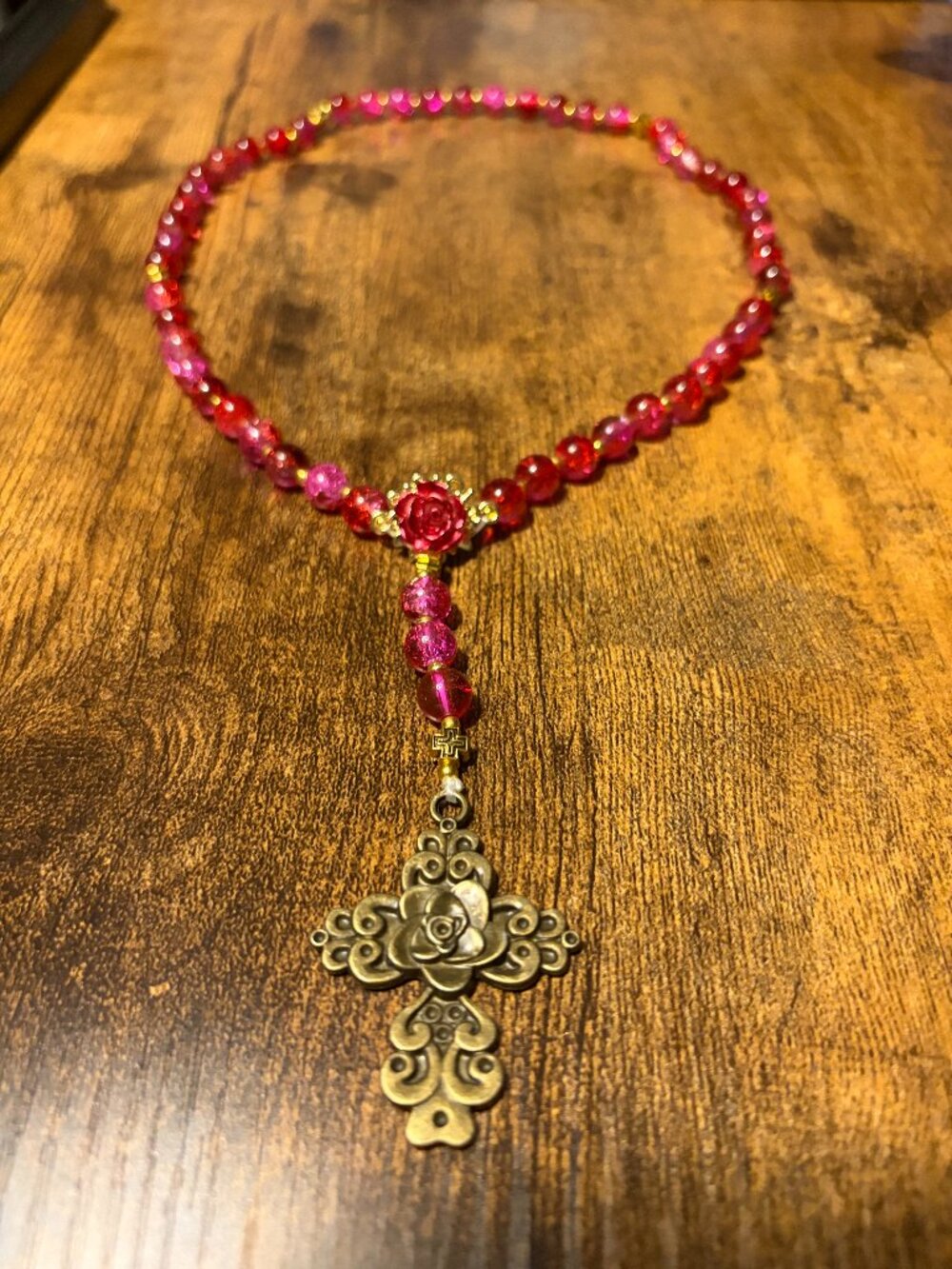 Rose Rosary Strand: Crimson Crackle Glass Beads & Bronze Floral Cross